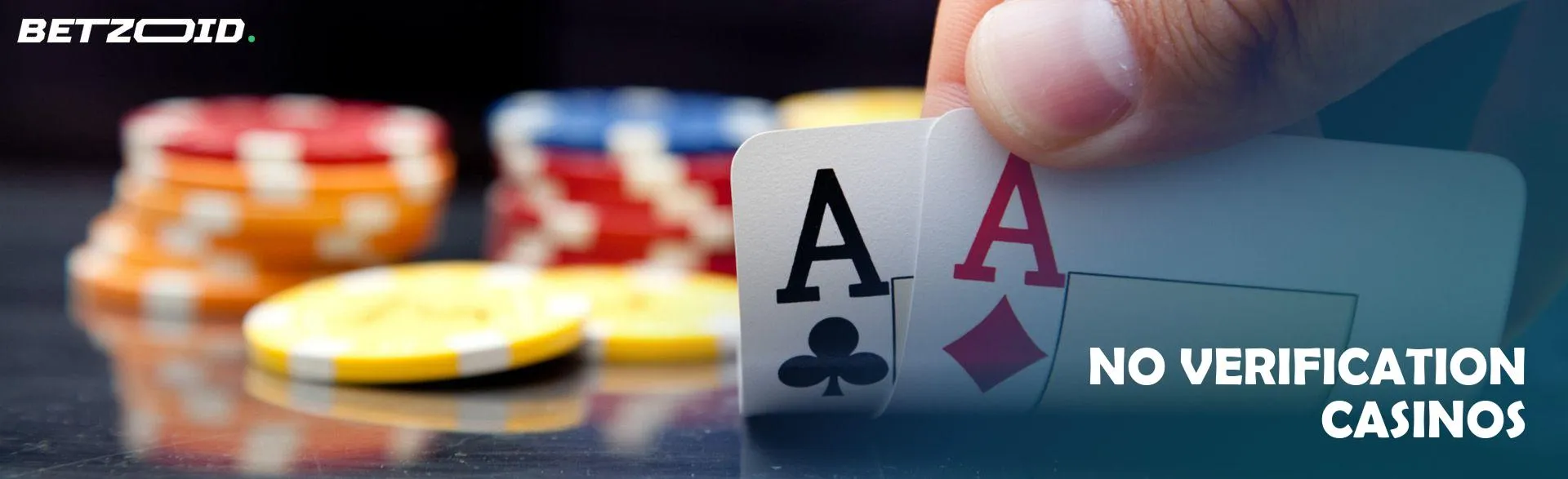 The player holds cards on the background of casino chips.