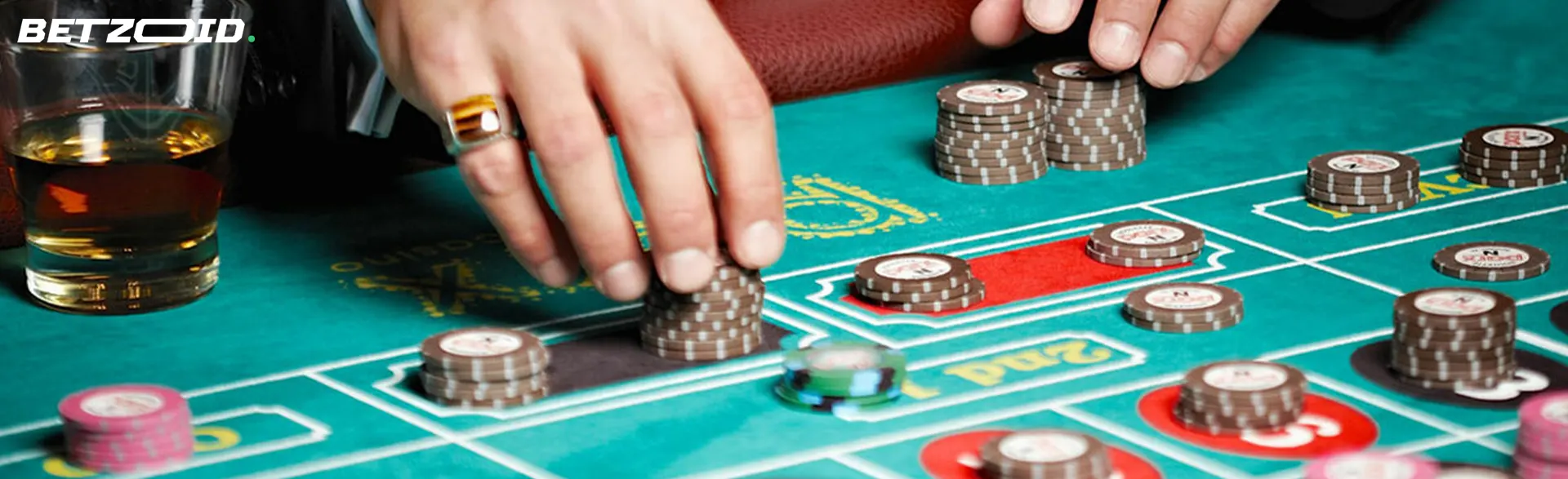 The player places chips on the casino table.