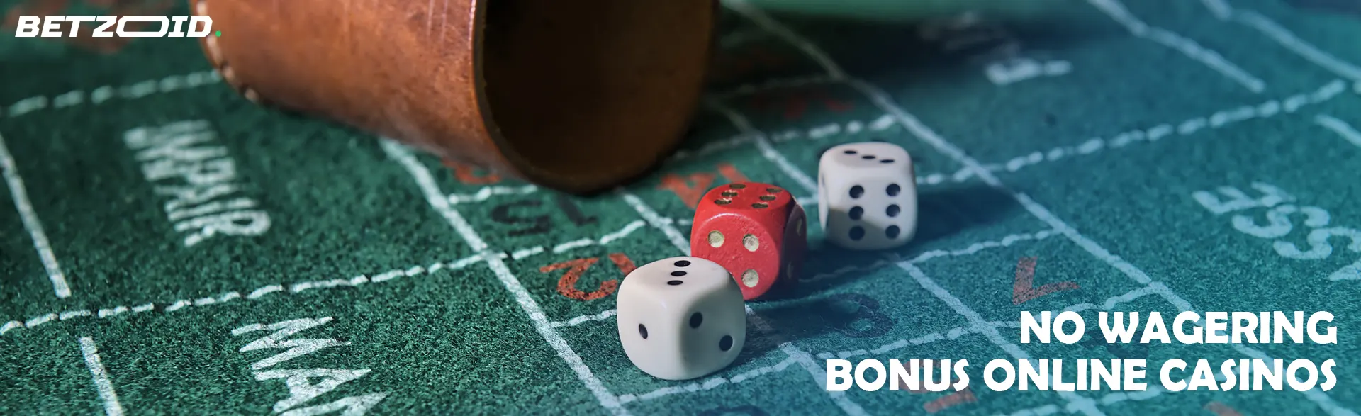 Dice next to the throwing bowl.