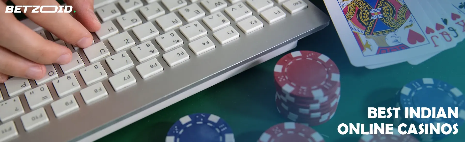 Cards and chips next to the keyboard.