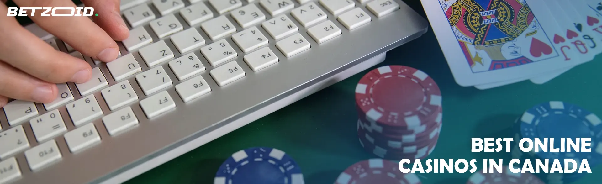 Casino cards and chips next to the keyboard.