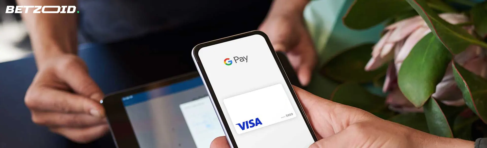 A person makes a payment using Google Pay.