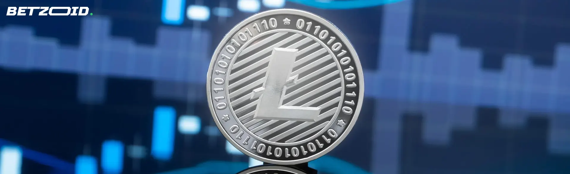 Une pièce de cryptomonnaie Litecoin sur fond de graphiques.