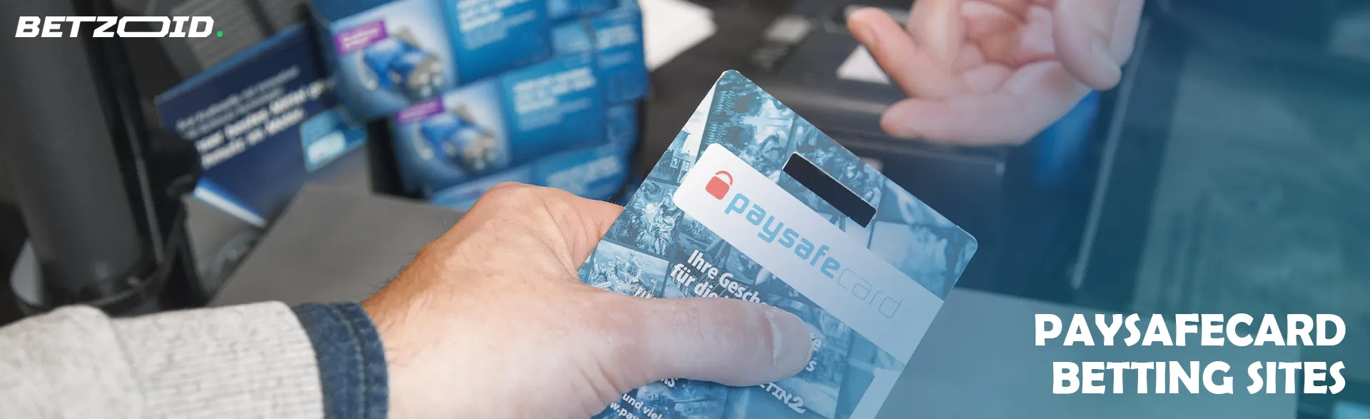 A person holds a packaged Paysafecard.