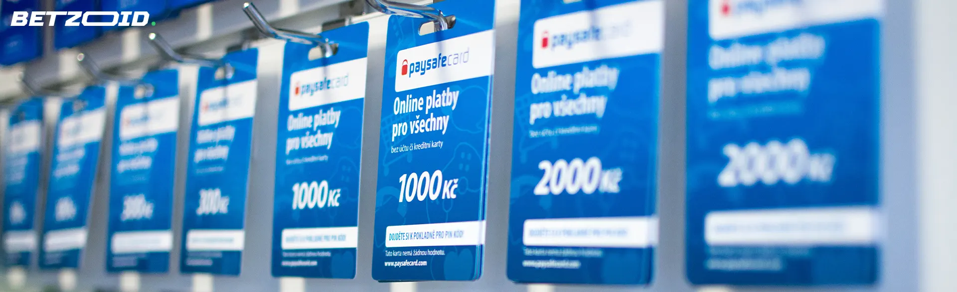 Counter with Paysafecard cards for online payments of various denominations.