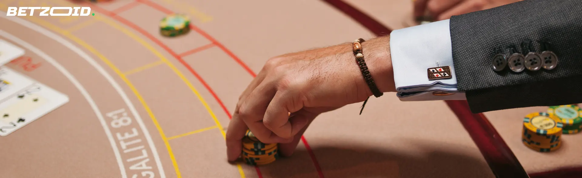 The player places chips on the casino table.