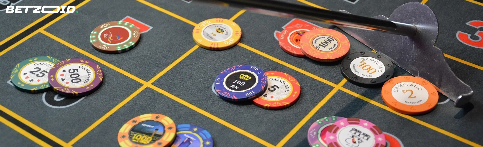 Multicolored chips on the casino table.