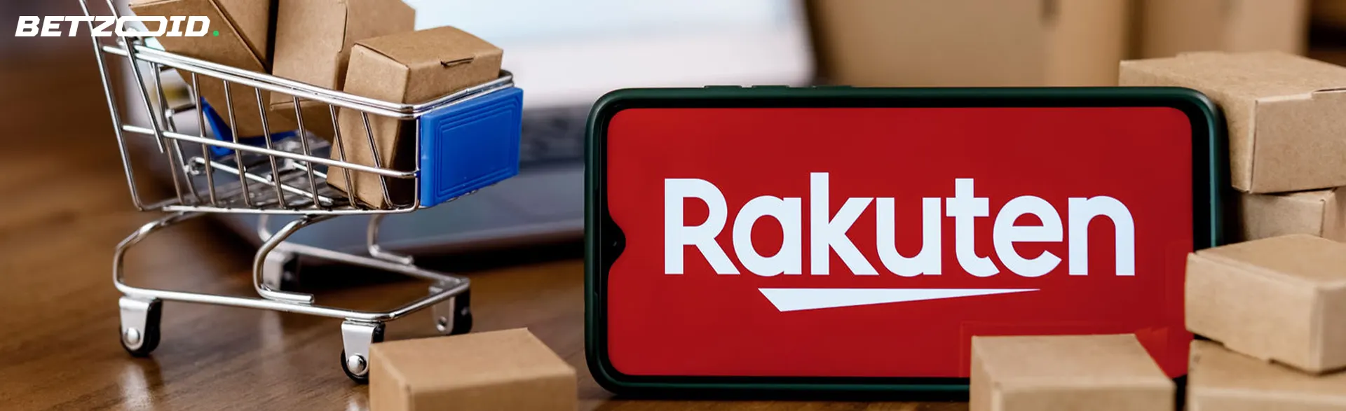 スマホ画面に楽天ロゴ。