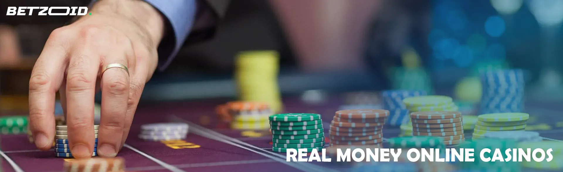 A player places chips on a casino table.