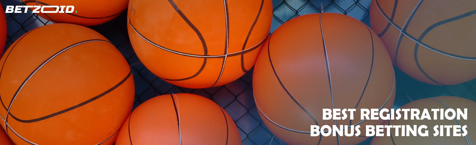 Several basketballs on the net.