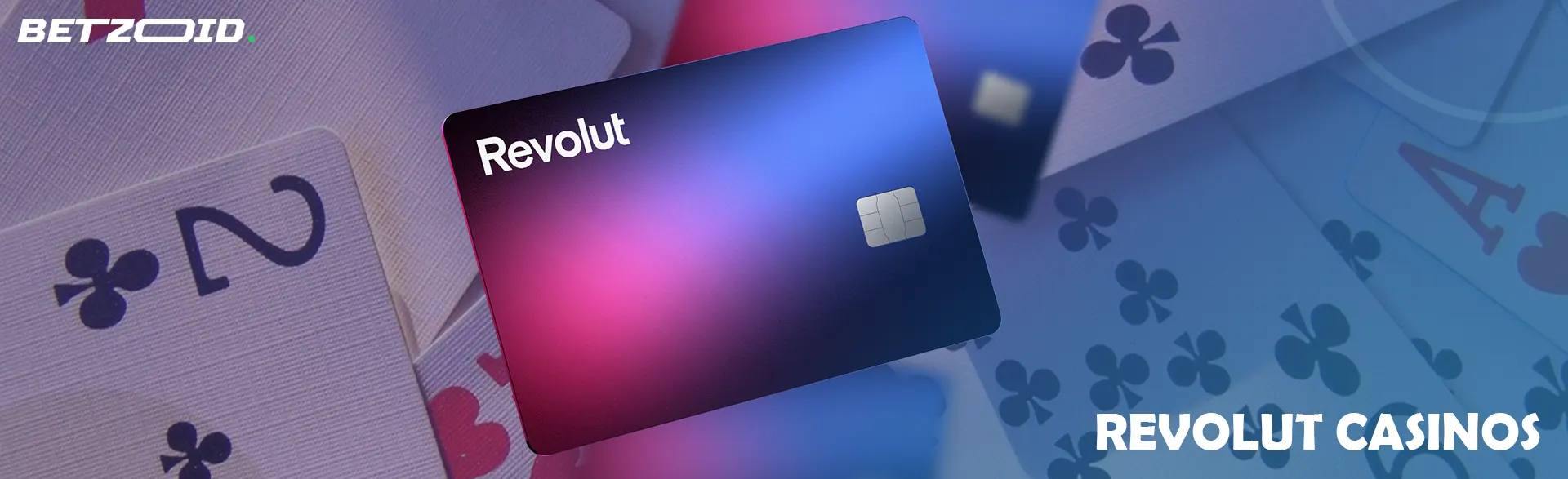 Revolut cards on a background of playing cards.