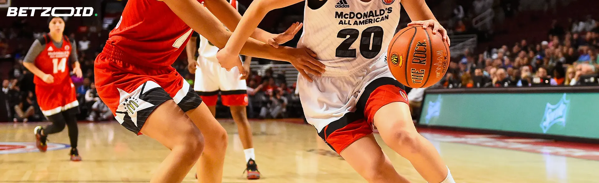 Basketball players in action during a match.