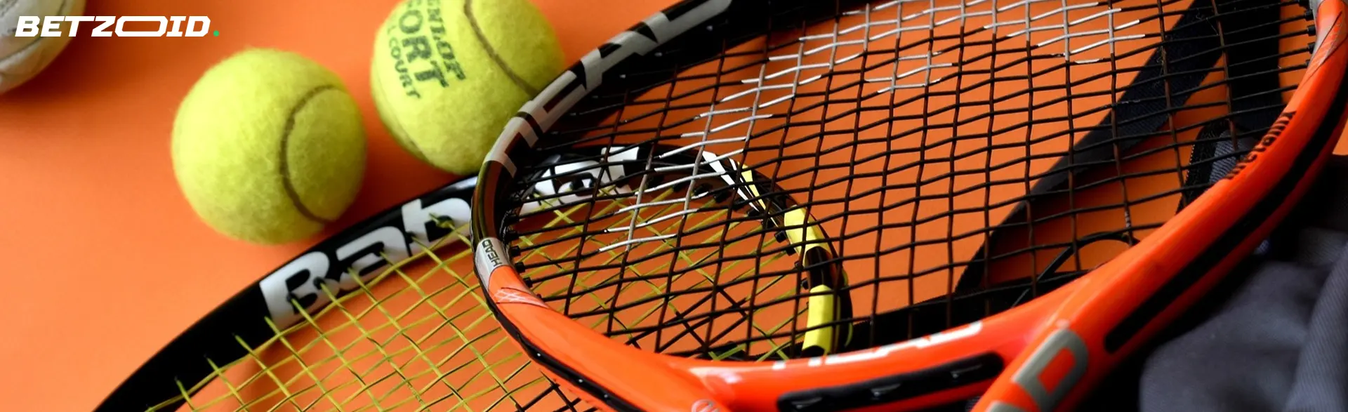 Tennis balls and rackets.