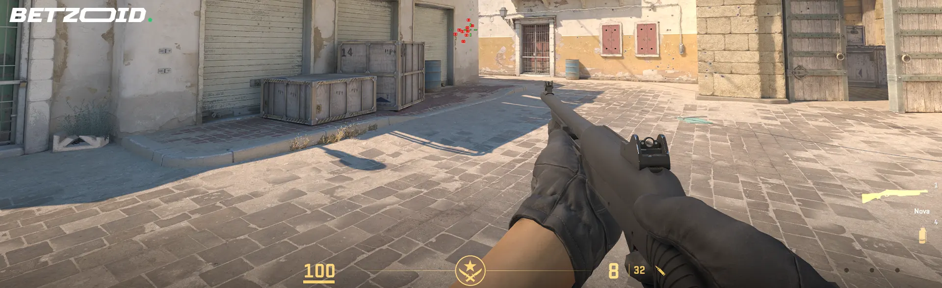 CS2 first person view on a desert map.