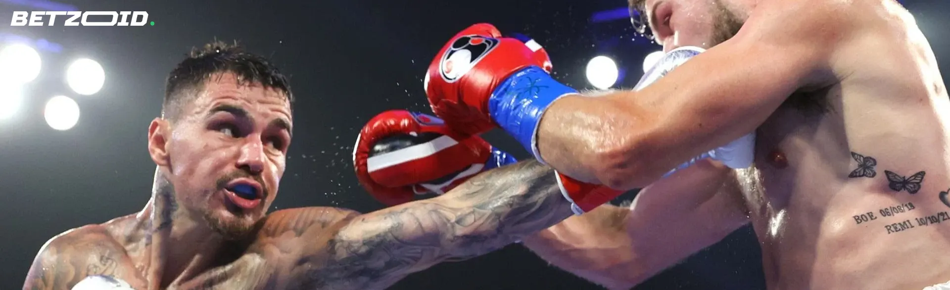 Boxers in action during a fight.