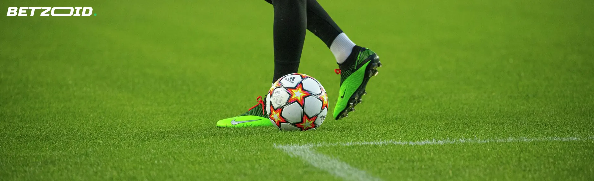 Football player with the ball on the field.