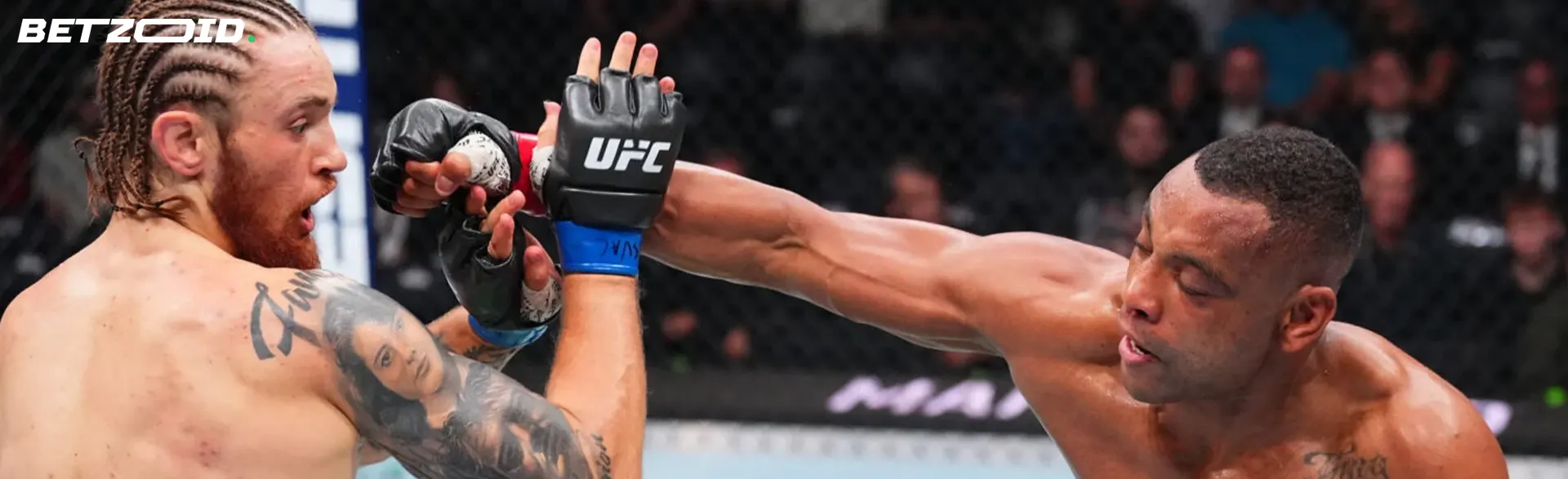 Two UFC fighters during a fight.