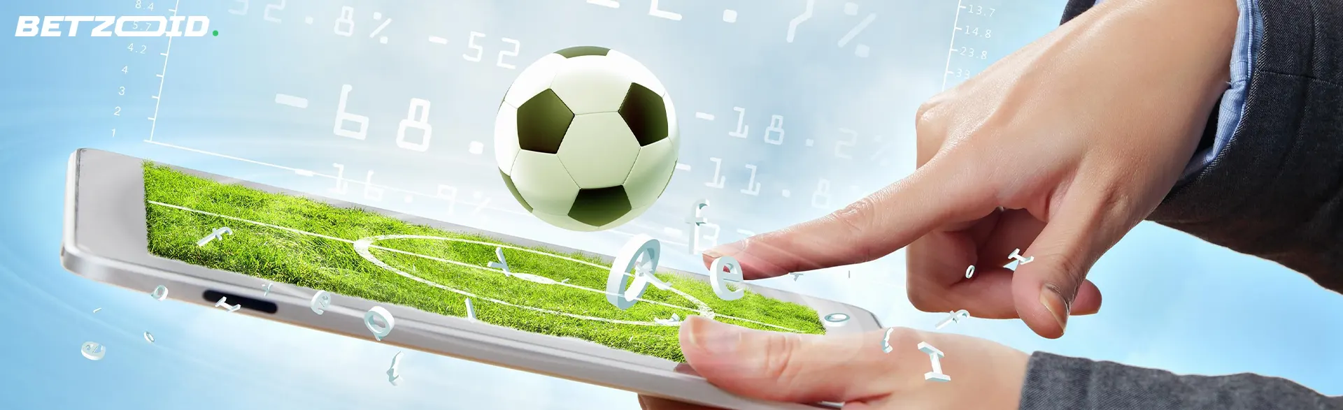 A person is holding a tablet showing a soccer field next to a soccer ball.