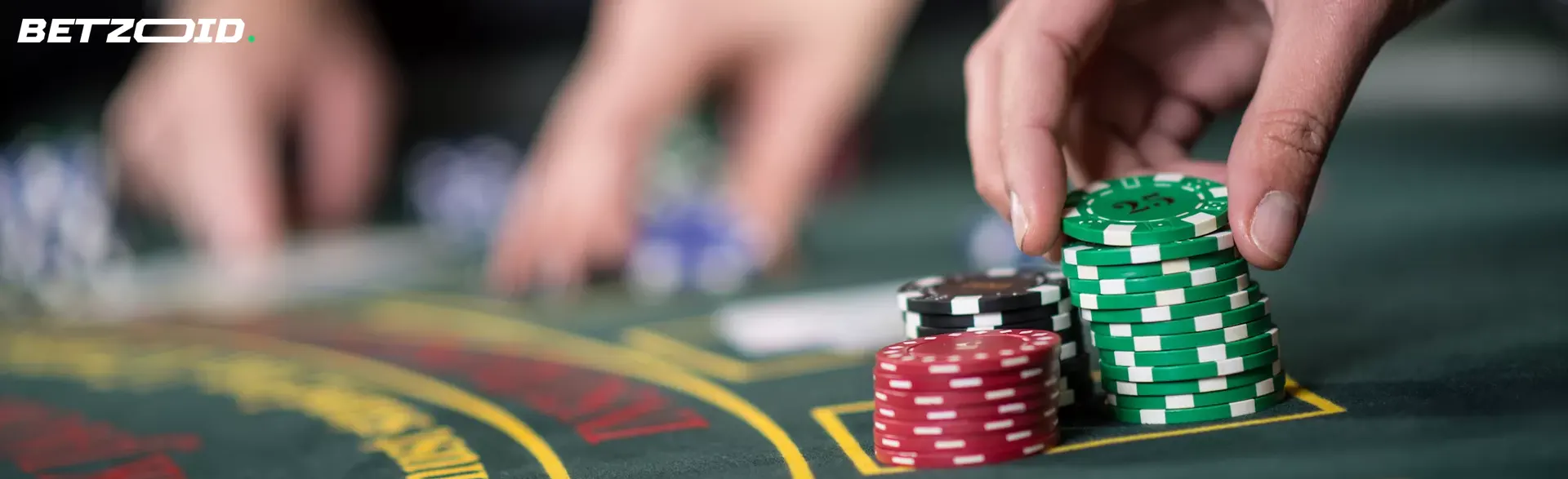 The player places chips on the casino table.