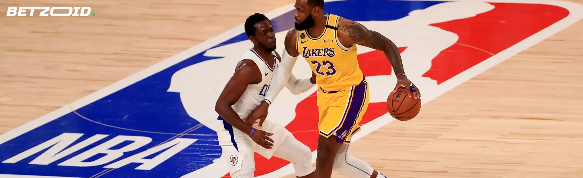 Basketball players in action during a match.