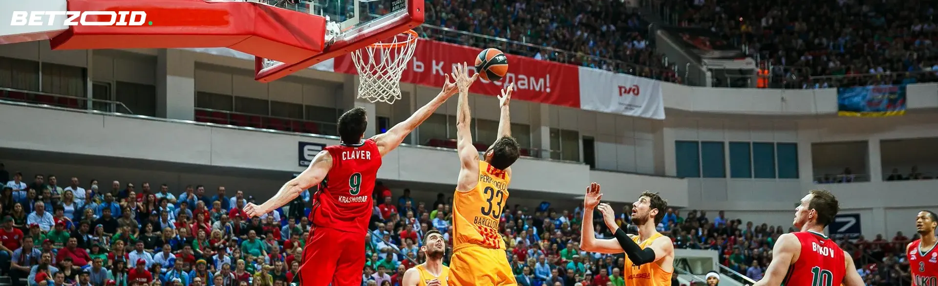 Basketball players in action during a match.