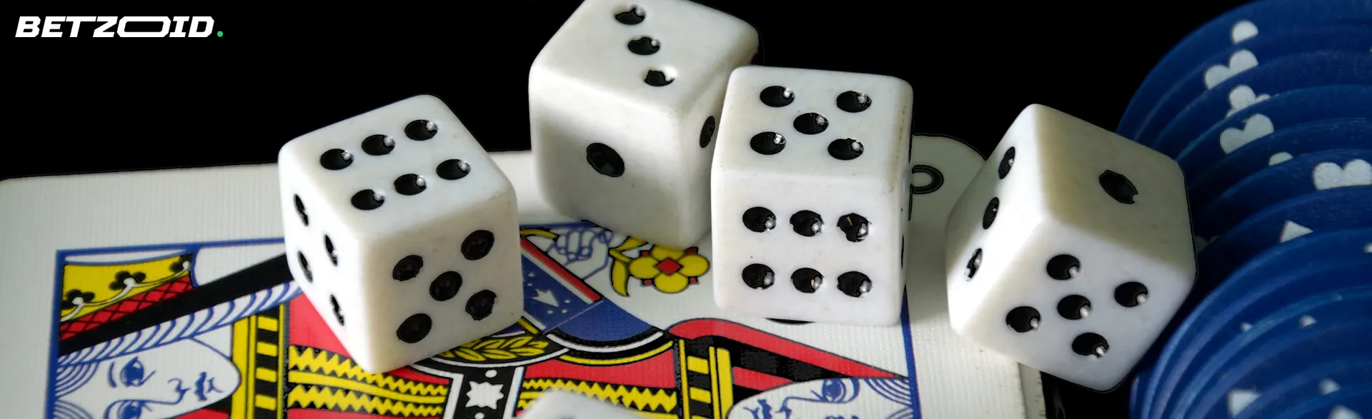 The dice and chips are on the cards.